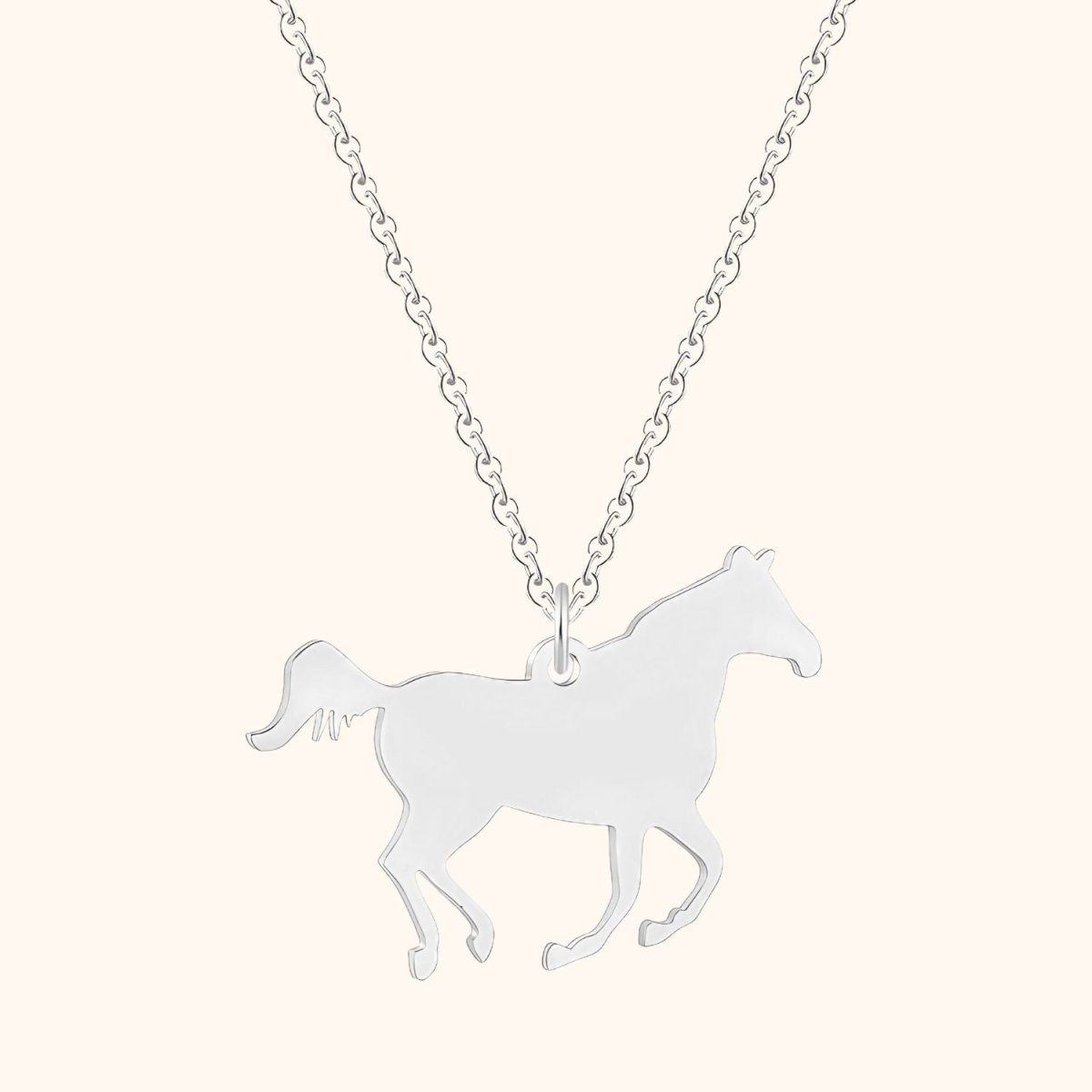 Halsband med silverfärgat hästmotiv